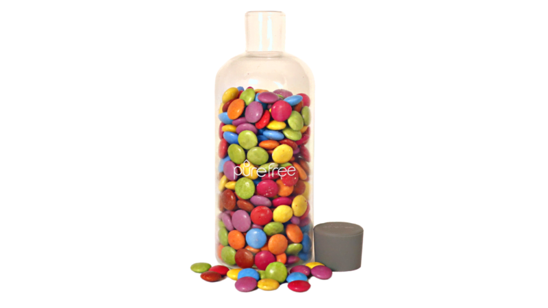 Glass storage and display bottle 500ml, with food grade silicon lid. Bottle contains lollies. Use for pantry or display in kitchen. Easily and quickly access lollies and treats for Christmas or celebrations. Pictured with lid off.