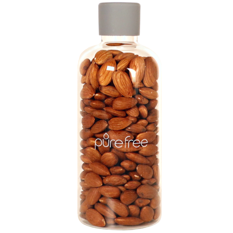 Glass storage and display bottle 500ml, with food grade silicon lid. Bottle contains nuts. Use for pantry or display in kitchen
